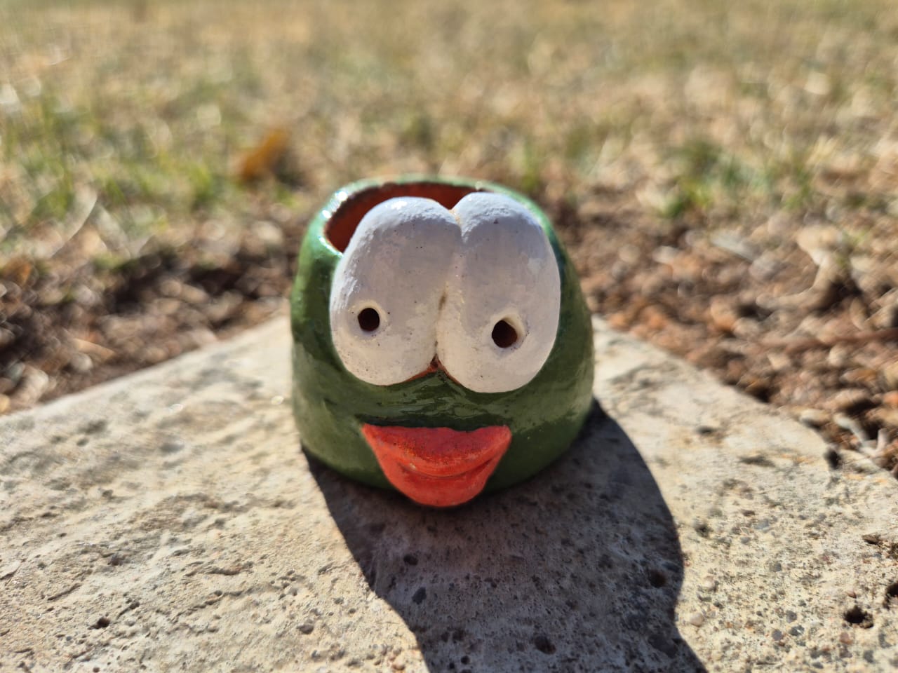 "Small Face Green" Clay Pot - Image 1